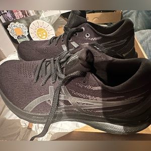 Brand new all black Asics sneakers never worn.